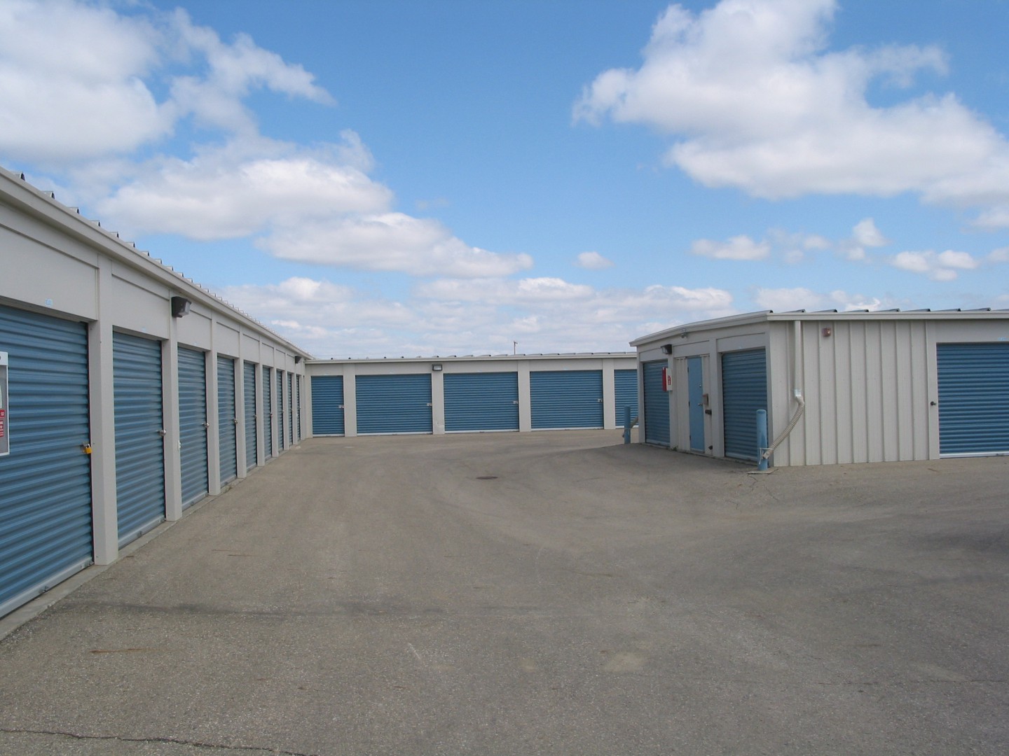 Rows of clean drive-up storage units at Stor All
